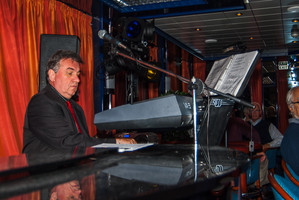 Musician entertaining in the lounge.