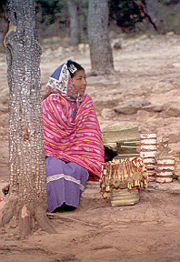 Tarahumara Indian with baskets.